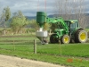 Helicopter fertiliser spreading buckets and loading systems